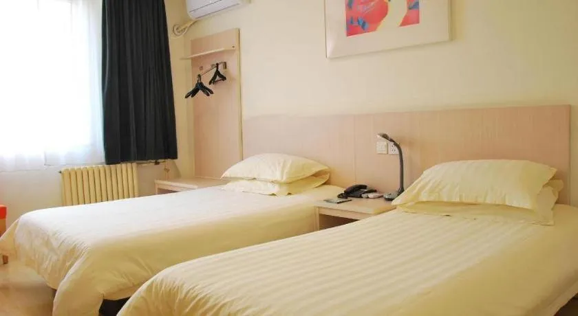 Bed in Jinjiang Inn Jinan Shimao Kuanhouli Quancheng Road