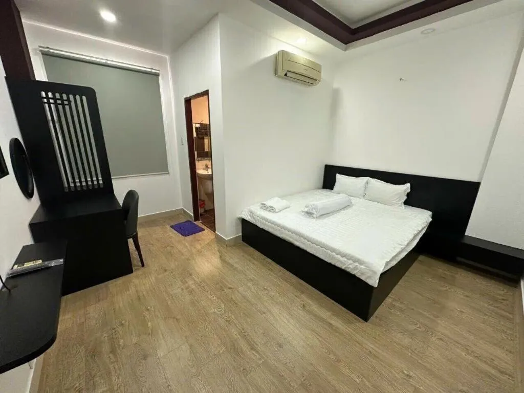 Bed in Tuan Viet Hotel Dinh Tien Hoang