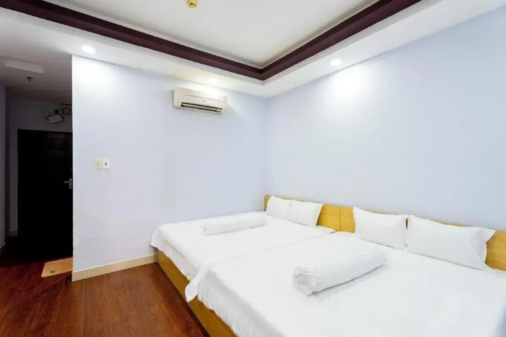 Bed in Tuan Viet Hotel Dinh Tien Hoang Bed in Tuan Viet Hotel Dinh Tien Hoang