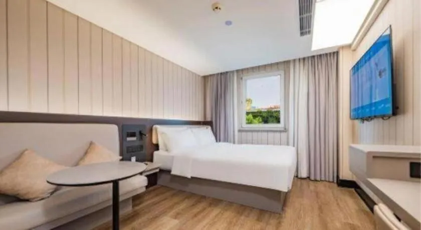 Bed in Ibis Chengdu Yongfeng Hotel