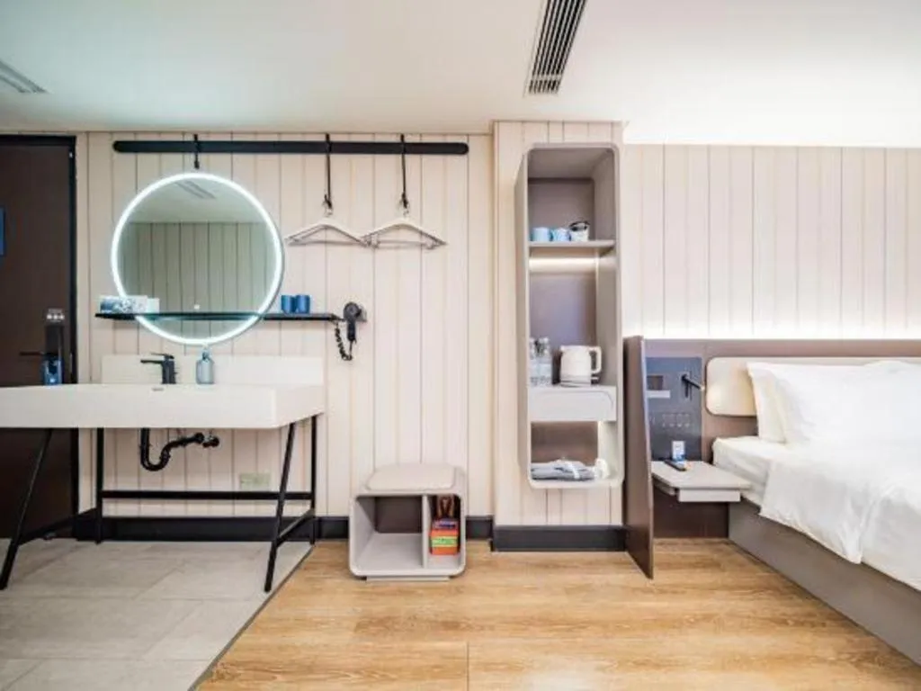 Bed in Ibis Chengdu Yongfeng Hotel