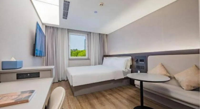 Bed in Ibis Chengdu Yongfeng Hotel