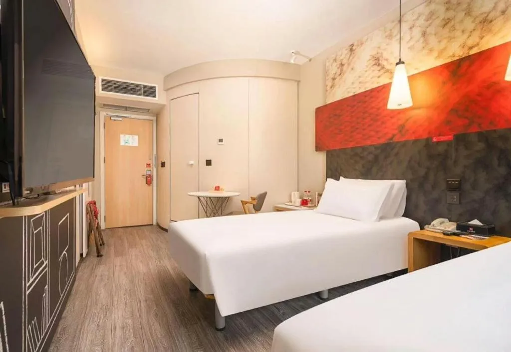 Bed in Ibis Chengdu Kehua Hotel