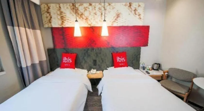 Bed in Ibis Chengdu Kehua Hotel