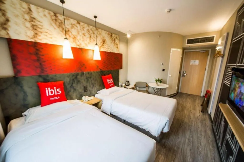 Bed in Ibis Chengdu Kehua Hotel