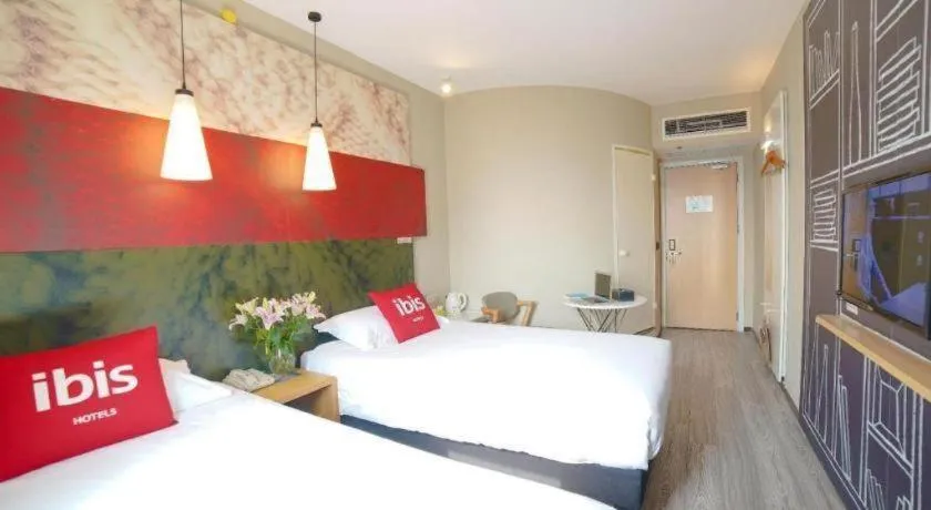 Bed in Ibis Chengdu Kehua Hotel