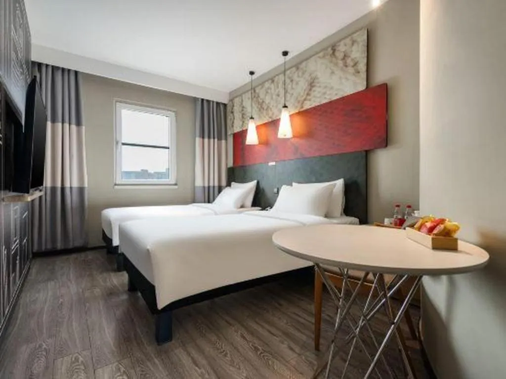 Bed in Ibis Chengdu Kehua Hotel