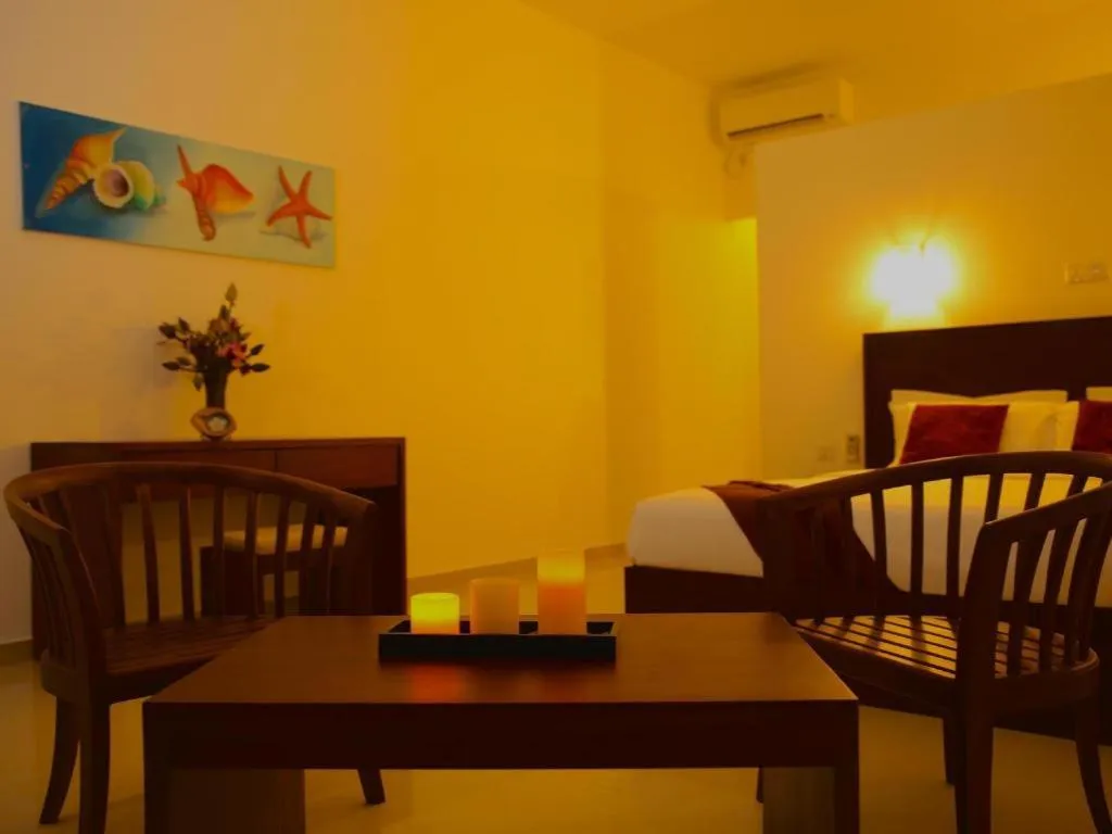 Whispering Palms Hotel