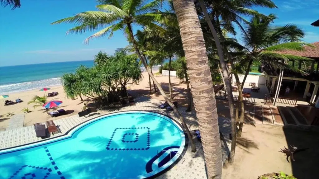 Whispering Palms Hotel