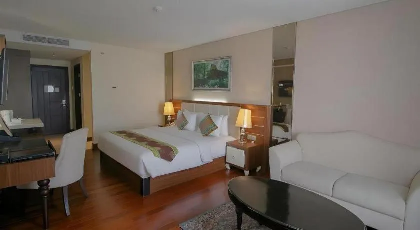 Bed in Grand Qin Hotel Syariah