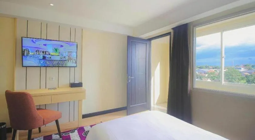 Bed in Grand Qin Hotel Syariah