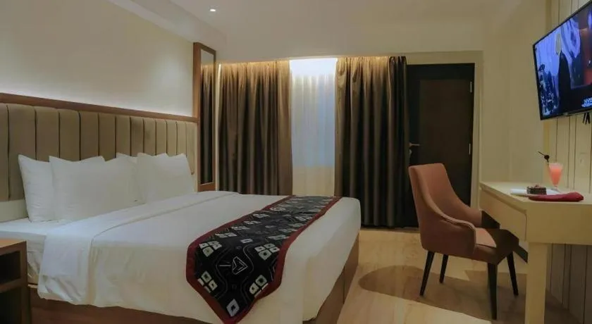 Bed in Grand Qin Hotel Syariah