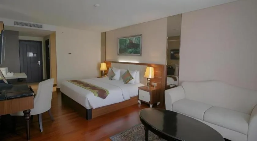 Bed in Grand Qin Hotel Syariah