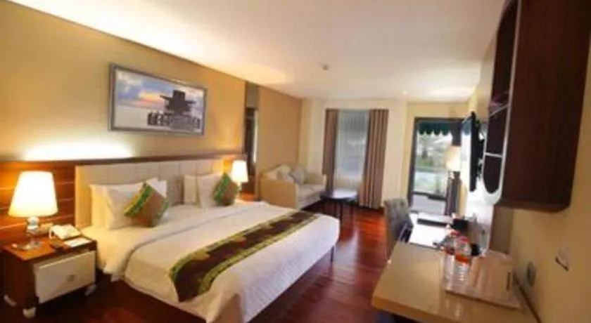 Bed in Grand Qin Hotel Syariah