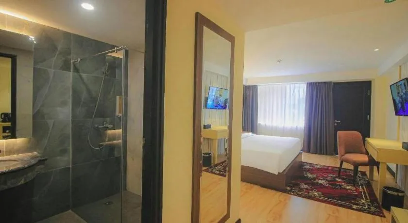 Bed in Grand Qin Hotel Syariah