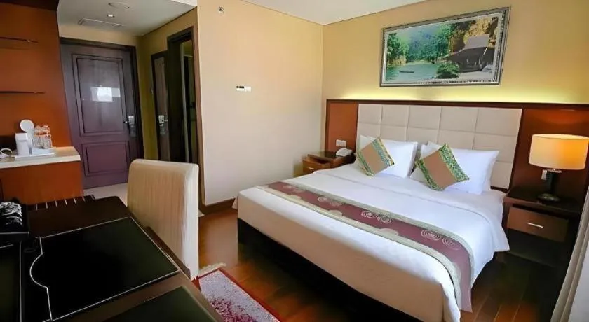 Bed in Grand Qin Hotel Syariah