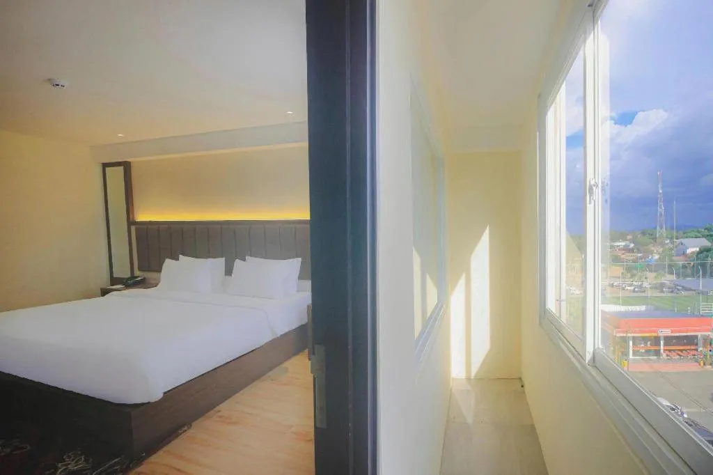 Bed in Grand Qin Hotel Syariah