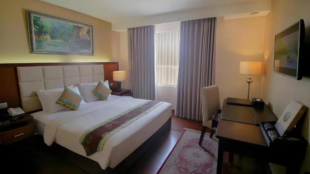 Bed in Grand Qin Hotel Syariah