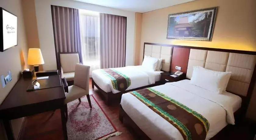 Bed in Grand Qin Hotel Syariah Bed in Grand Qin Hotel Syariah