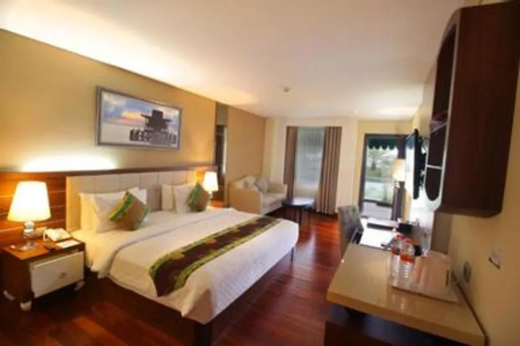 Bed in Grand Qin Hotel Syariah