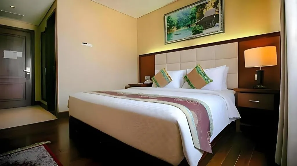 Bed in Grand Qin Hotel Syariah