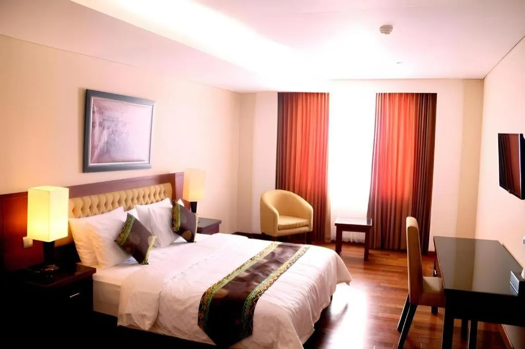 Bed in Grand Qin Hotel Syariah