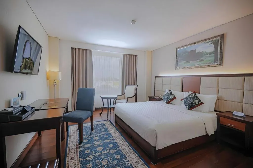 Bed in Grand Qin Hotel Syariah