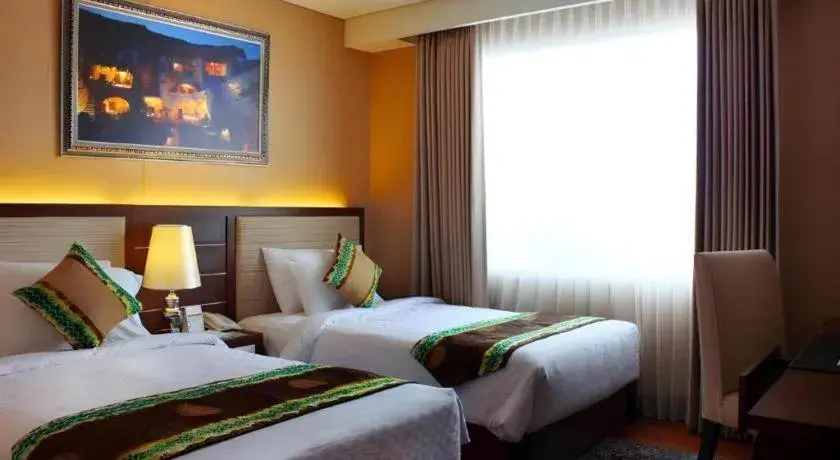 Bed in Grand Qin Hotel Syariah Bed in Grand Qin Hotel Syariah