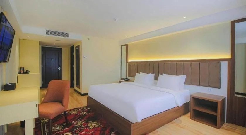 Bed in Grand Qin Hotel Syariah