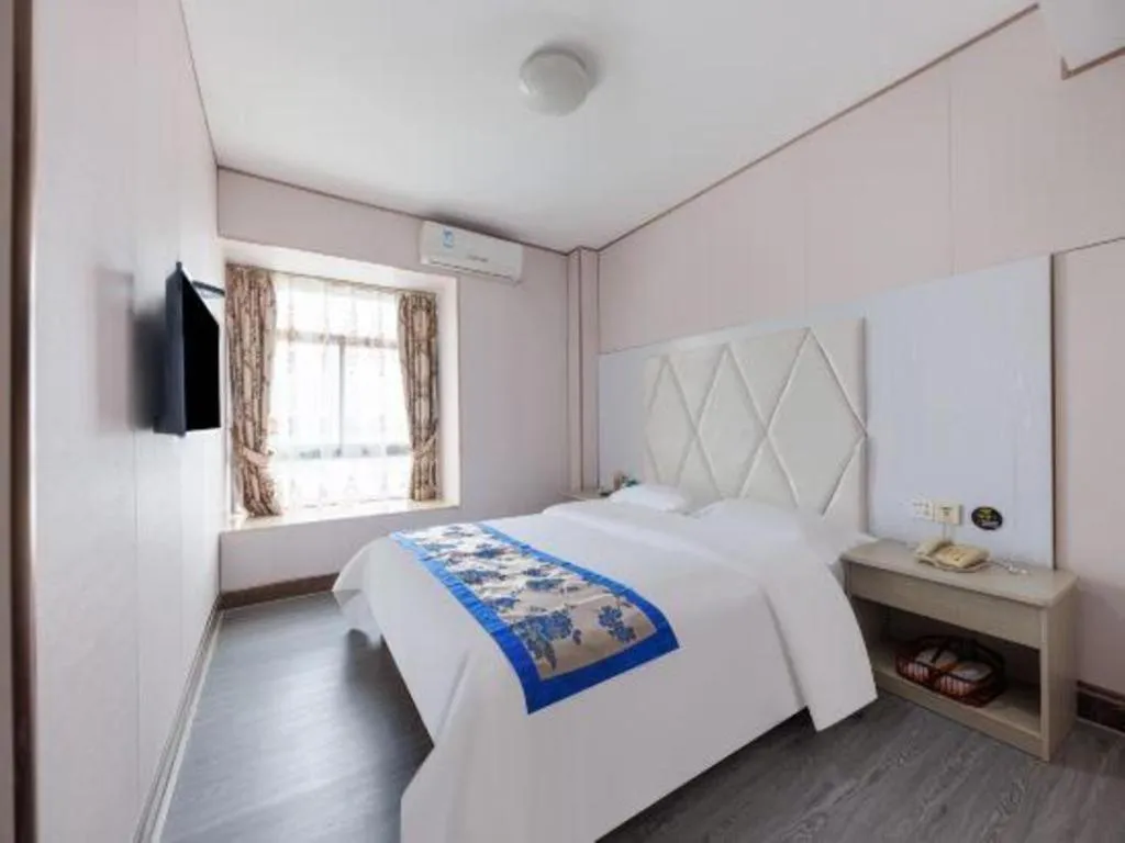Bed in Guangzhou Junye International Hotel