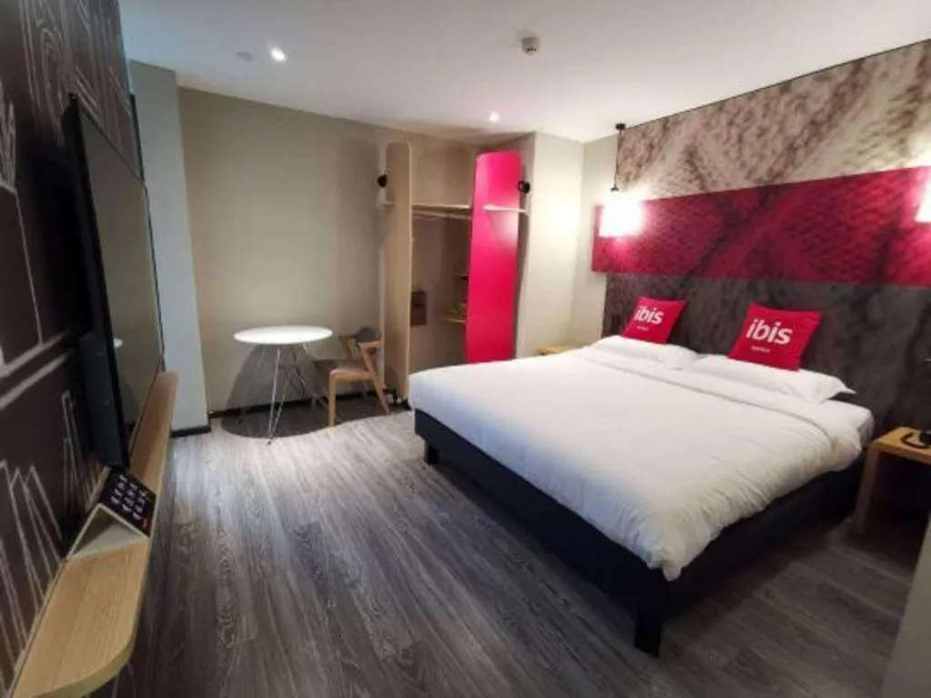 Bed in Hanting Hotel Wuxi Taihu Lake Plaza Branch