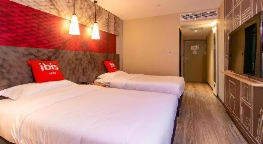 Bed in Hanting Hotel Wuxi Taihu Lake Plaza Branch