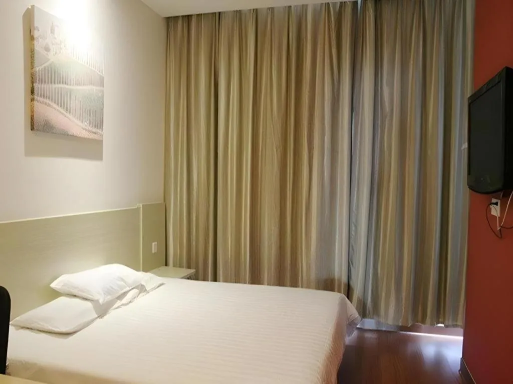 Bed in Hanting Hotel Wuxi Taihu Lake Plaza Branch