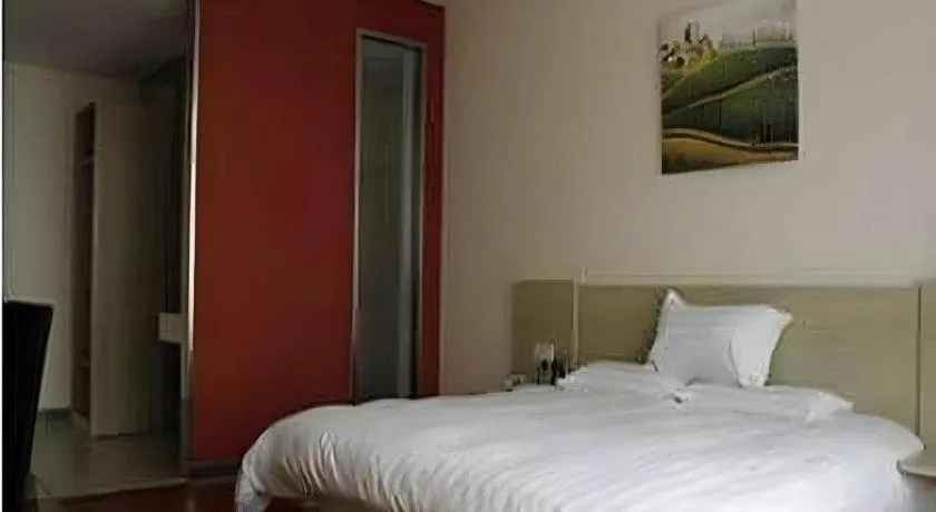 Bed in Hanting Hotel Wuxi Taihu Lake Plaza Branch