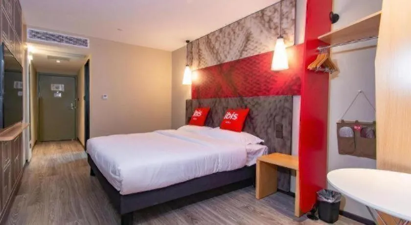 Bed in Hanting Hotel Wuxi Taihu Lake Plaza Branch