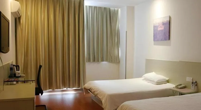 Bed in Hanting Hotel Wuxi Taihu Lake Plaza Branch