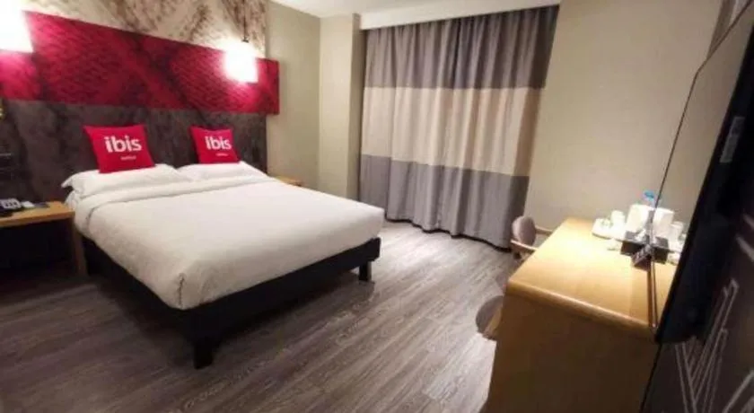 Bed in Hanting Hotel Wuxi Taihu Lake Plaza Branch