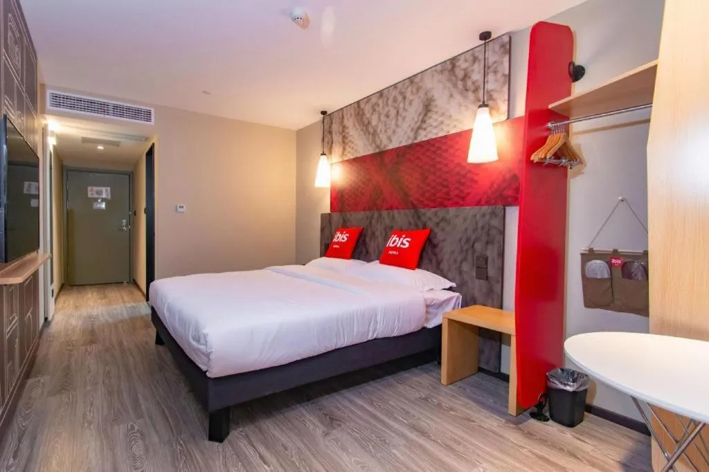 Bed in Hanting Hotel Wuxi Taihu Lake Plaza Branch