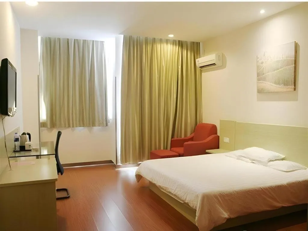 Bed in Hanting Hotel Wuxi Taihu Lake Plaza Branch