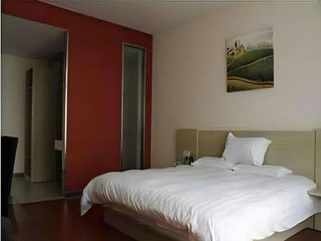 Bed in Hanting Hotel Wuxi Taihu Lake Plaza Branch