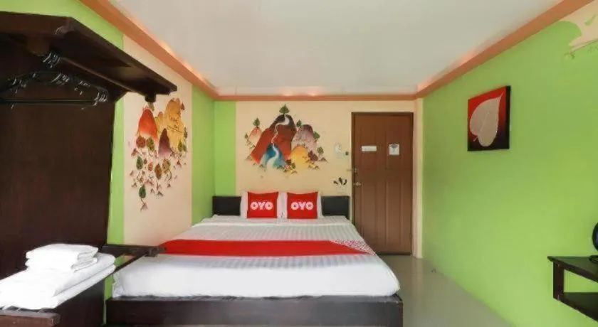 Bed in OYO 768 First Station Hotel