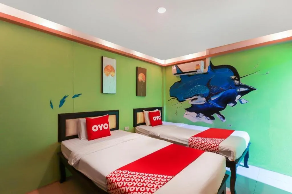 Bed in OYO 768 First Station Hotel