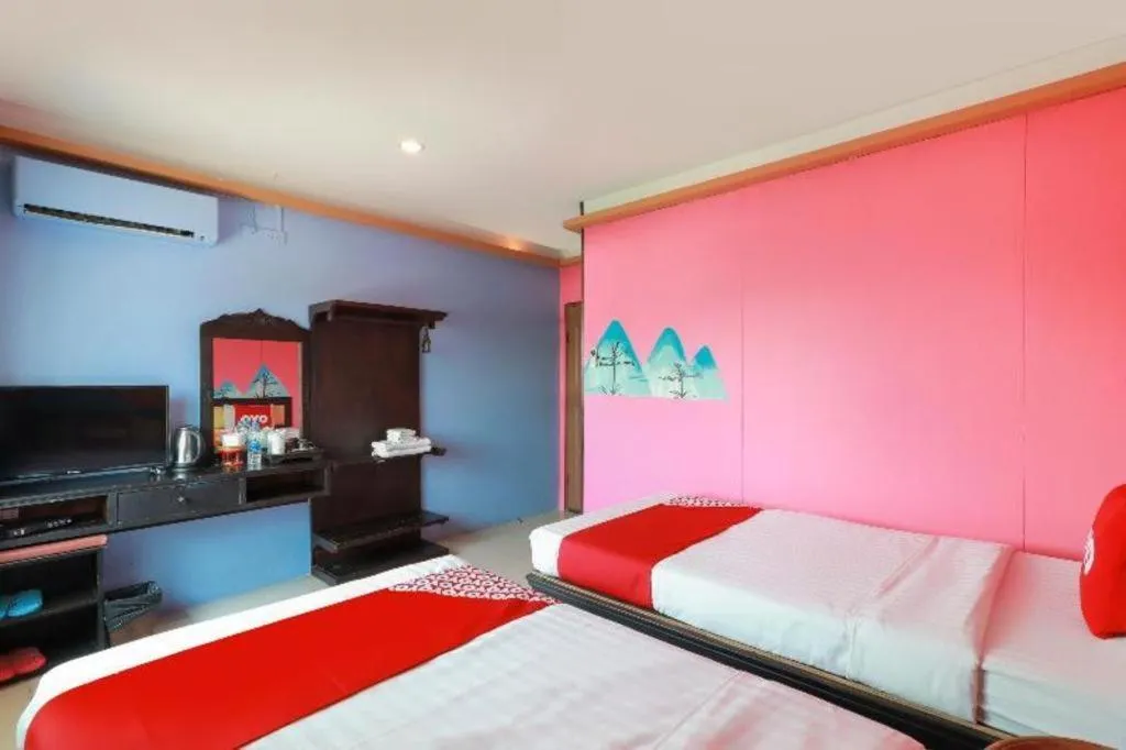 Bed in OYO 768 First Station Hotel