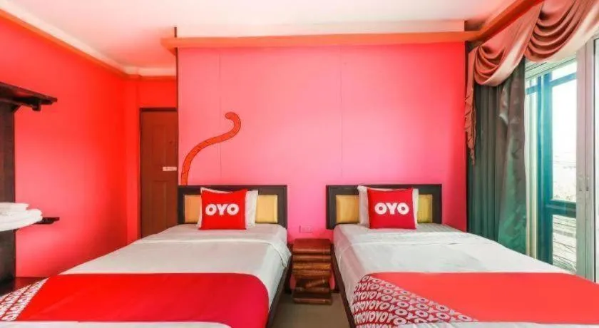 Bed in OYO 768 First Station Hotel