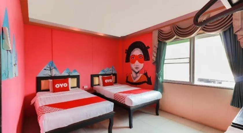 Bed in OYO 768 First Station Hotel