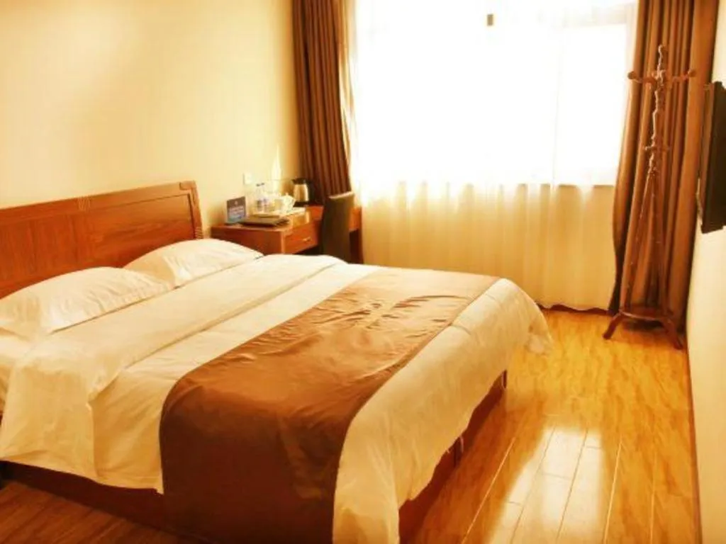 Bed in Beijing Wanjia Traders Hotel