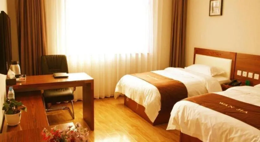 Bed in Beijing Wanjia Traders Hotel