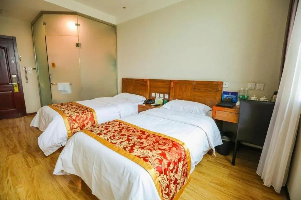 Bed in Beijing Wanjia Traders Hotel