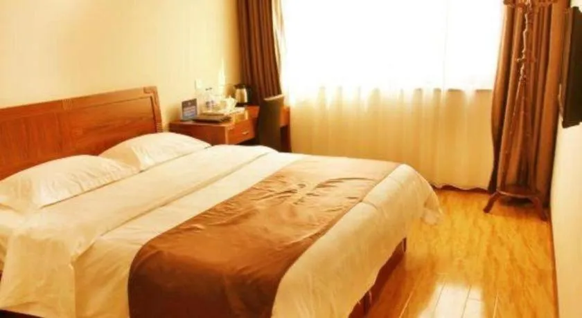 Bed in Beijing Wanjia Traders Hotel