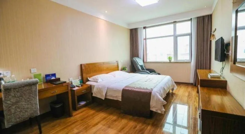 Bed in Beijing Wanjia Traders Hotel